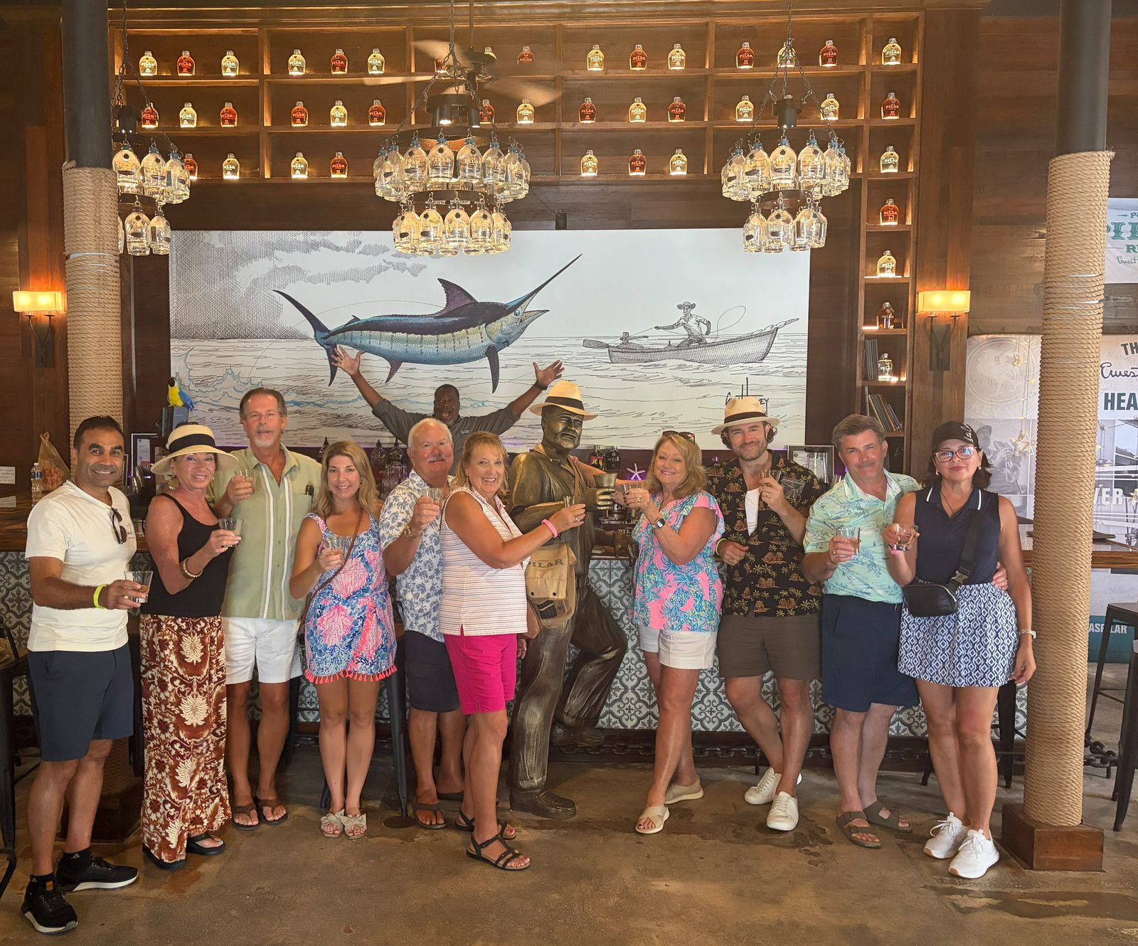 Members of the LOA Insurance Advisory Council raising a toast together at a bar.